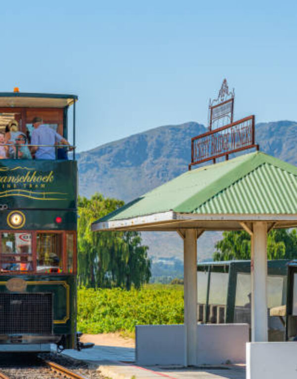FRANSCHHOEK WESTERN CAPE SOUTH AFRICA - FEBRUARY, 02. 2020 - Rickety Bridge Winery Railway Station for Tourist Tram ride between Vineyards in the Franschhoek Valley Southern Africa
